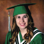 Raylyn Koshowki in a graduation gown and 2024 graduation cap.