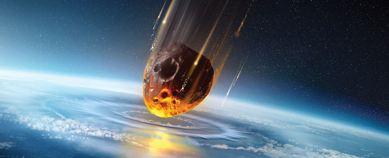 A mock asteroid falls towards the earth and starts to make impact.