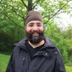 Harmeet Singh Chawla smiles at the camera.